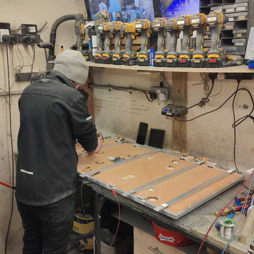 LED dance floor panel being repaired